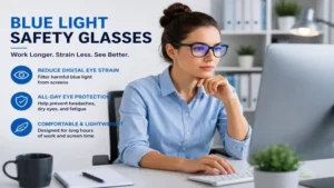Professional wearing blue light safety glasses during long hours of computer work.